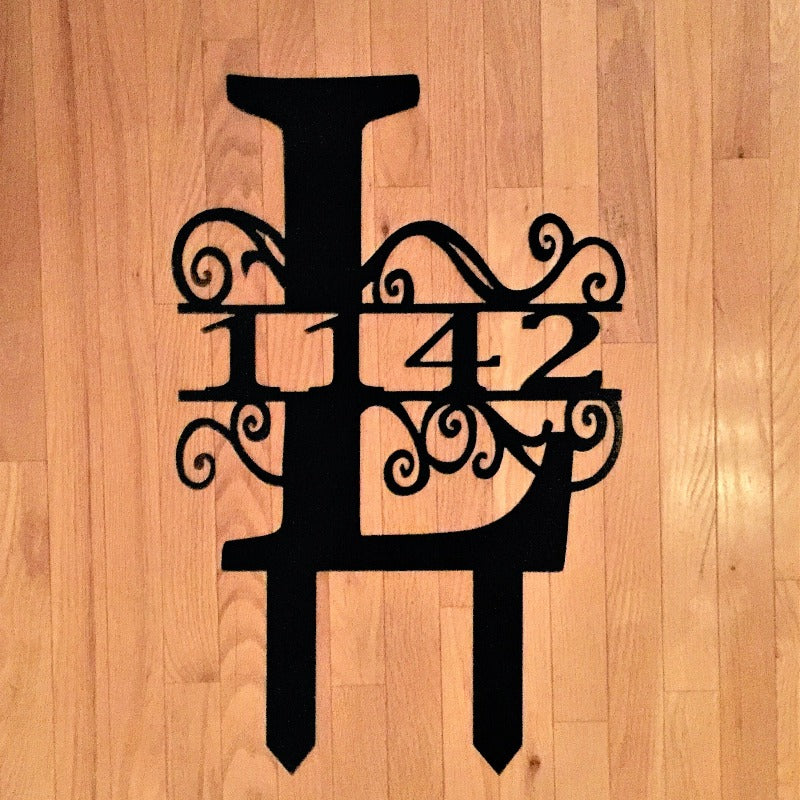 swirly monogram with family name or address stake