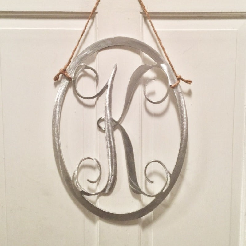 oval single letter monogram